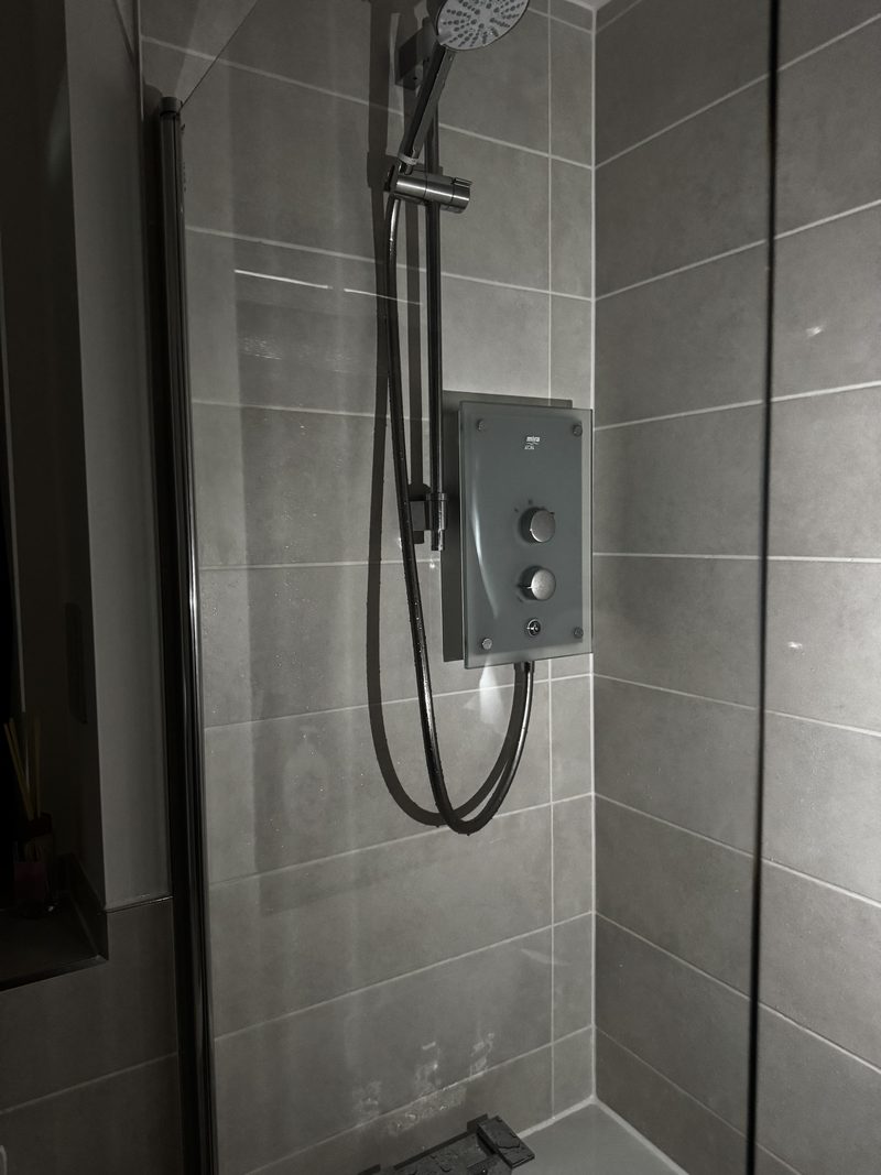 A shower screen and shower panel