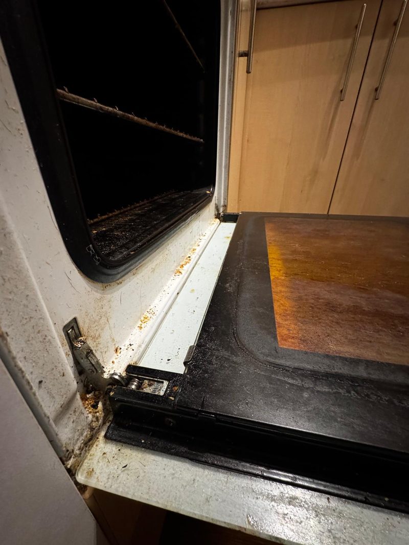 An oven with the door open