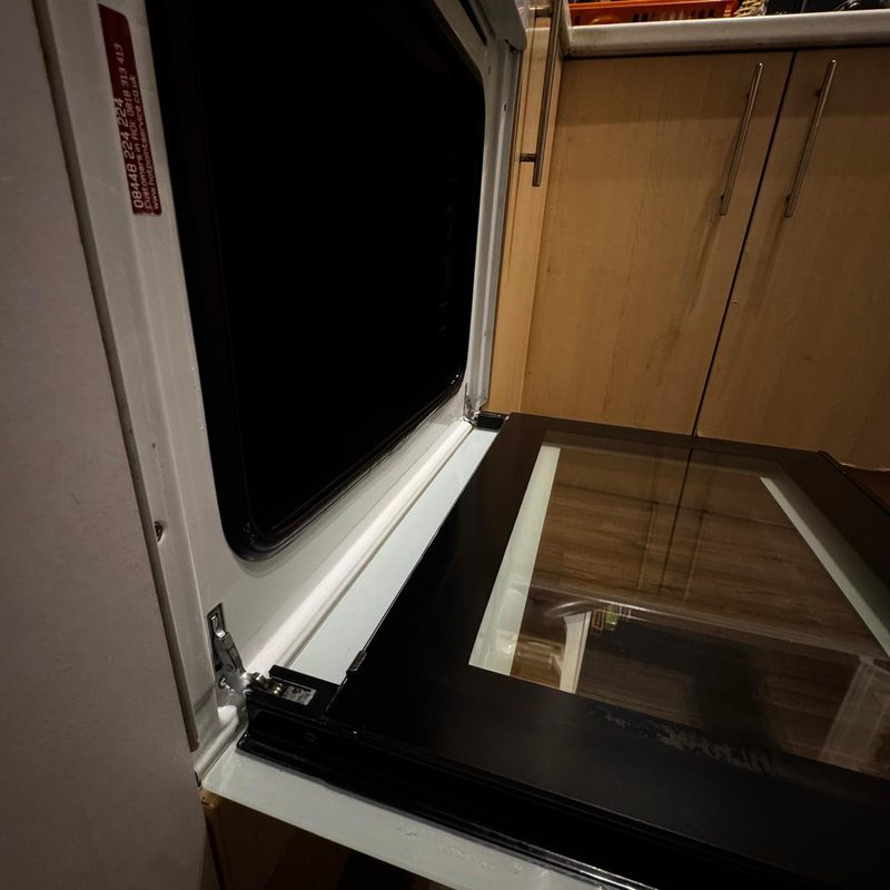 An oven door and glass