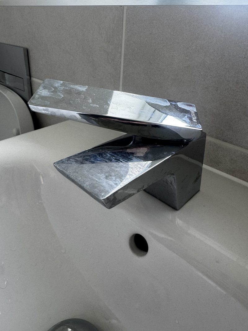 A bathroom tap after descaling